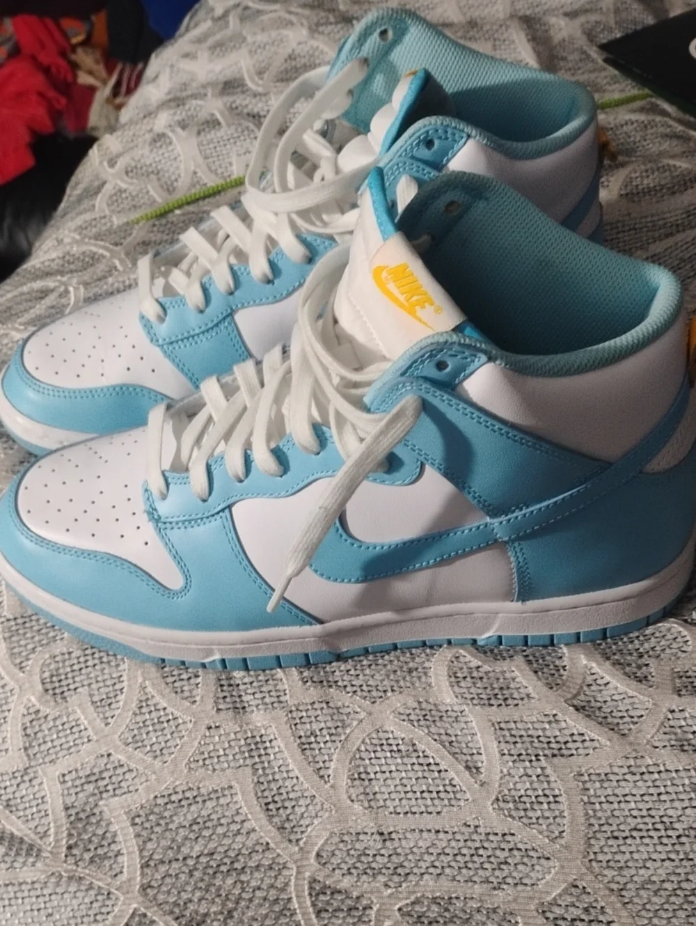 Nike High-Top Sneakers in Light Blue and White with Yellow Logo